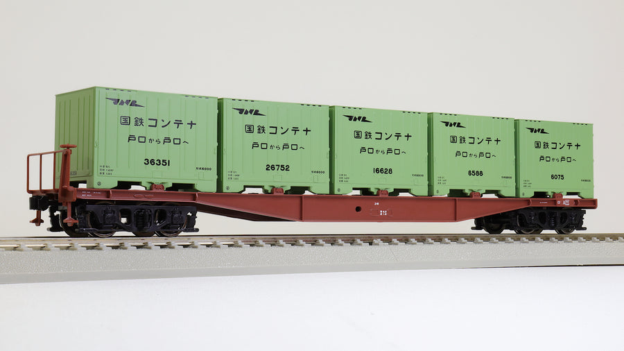 58031 KOKI5500 Freight car (4 vertical ribs) with type 6000 container(green)